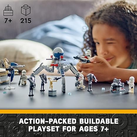 Child playing with Lego Star Wars Clone Trooper & Battle Droid Battle Pack set.