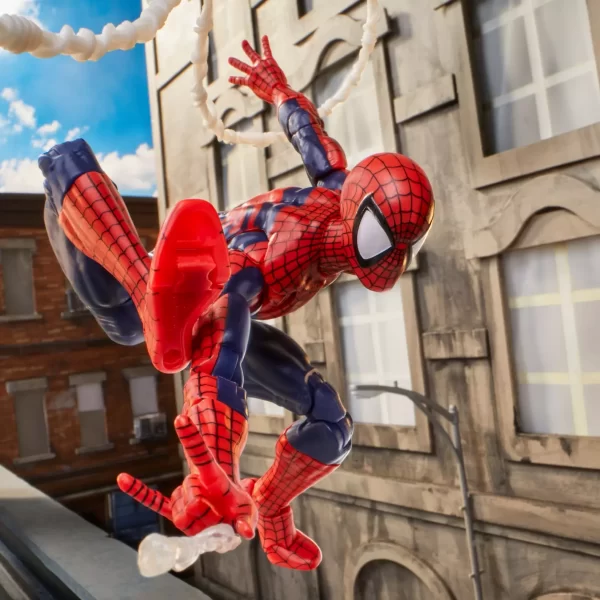 Hasbro Marvel Legends Maximum Series Spider-Man in a McFarlane style pose firing a web line while swinging.