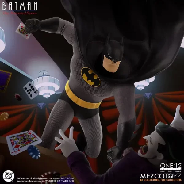Mezco Toyz One:12 Collective Batman: The Animated Series Batman lunging across a table at Joker.