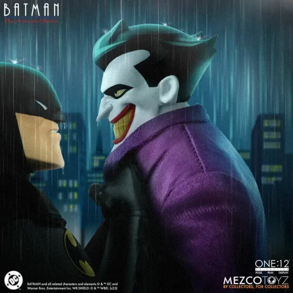 Mezco Toyz One:12 Collective Batman: The Animated Series The Joker being grabbed by his suit jacket collar.