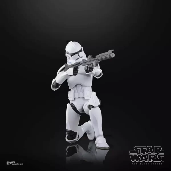 Hasbro Star Wars The Black Series Phase II Clone Trooper kneeling and aiming down the barrel of his rifle blaster.