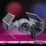 Hasbro Star Wars The Vintage Collection Darth Vader's TIE Advanced with Vader standing in front of it.