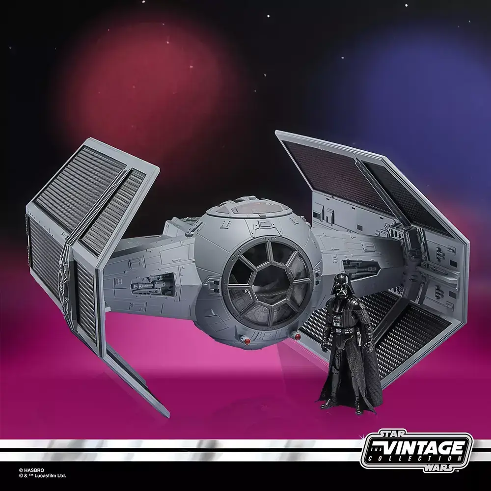 Hasbro Star Wars The Vintage Collection Darth Vader's TIE Advanced with Vader standing in front of it.