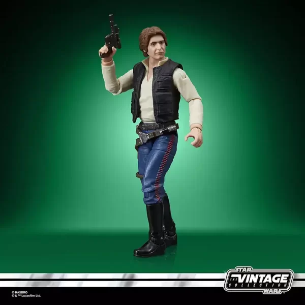 Hasbro Star Wars The Vintage Collection Han Solo with blaster raised about his head.